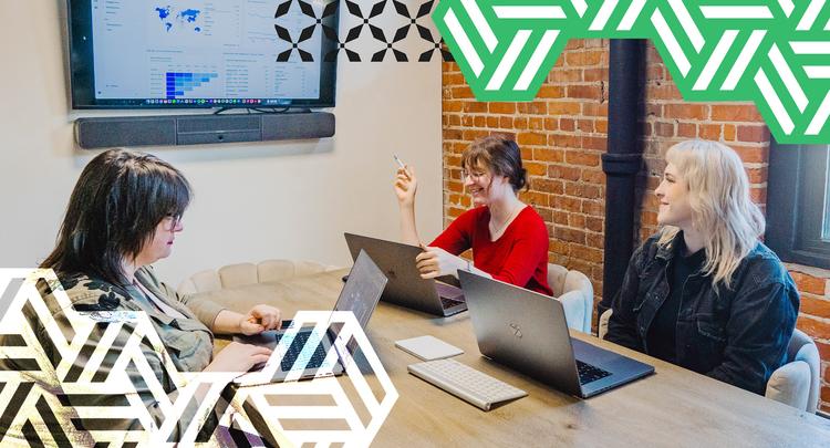 coworkers reviewing analytics