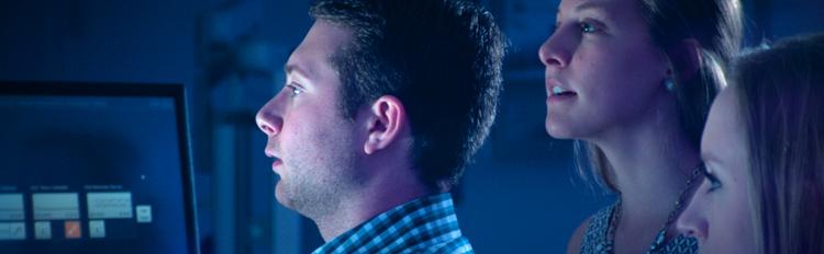 people looking at computer screen