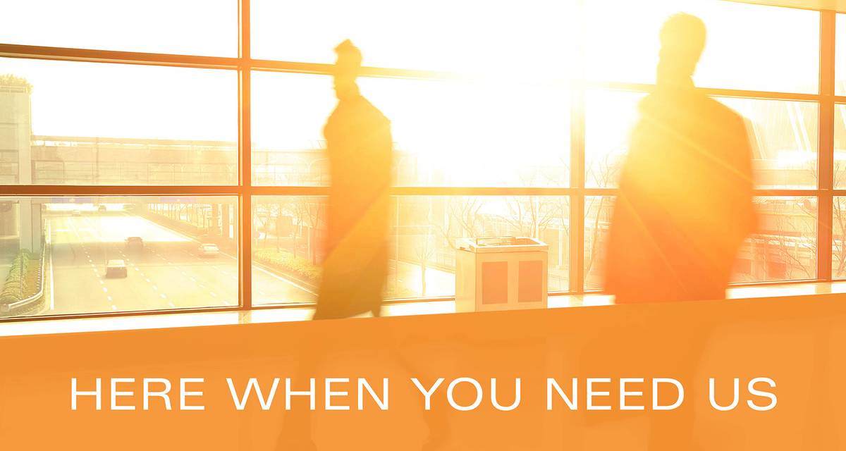 people walking in workspace