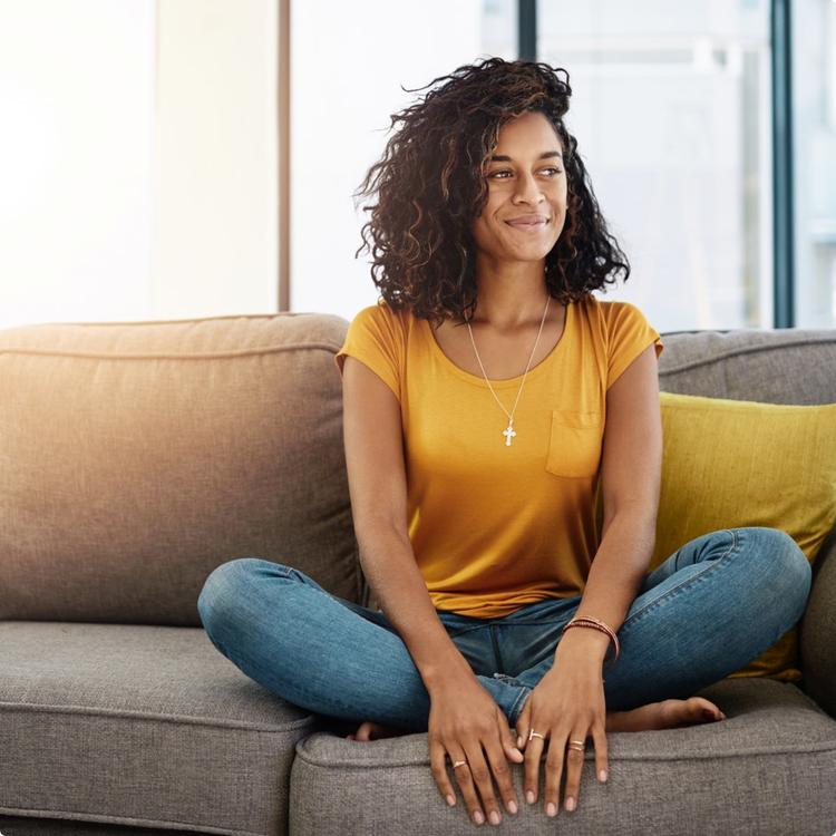 woman sitting on couch