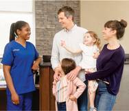 photo of nurse with family