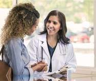 photo of doctor with woman