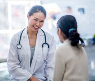 photo of doctor with woman
