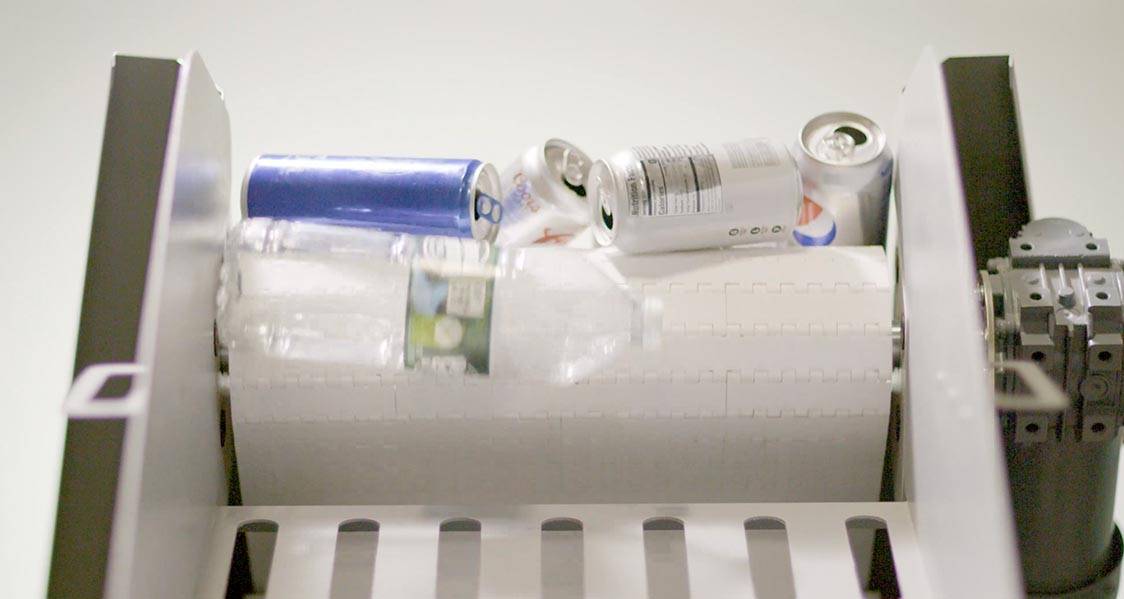 Recycled Bottles and Cans Being Returned