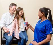 photo of nurse with family